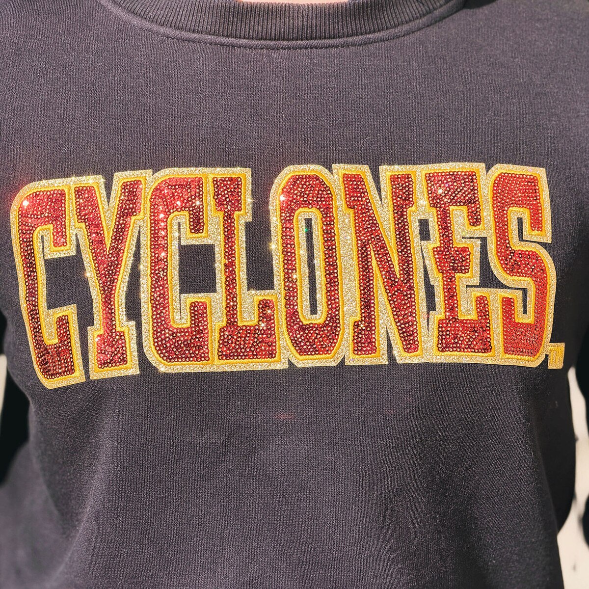 Posh Play Women's Cyclones Black Sequin Crewneck design close up